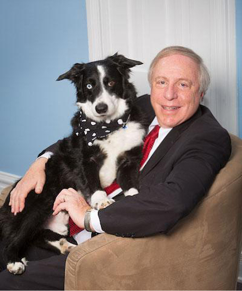litman-dog-edit 1 david littman sitting with his dog
